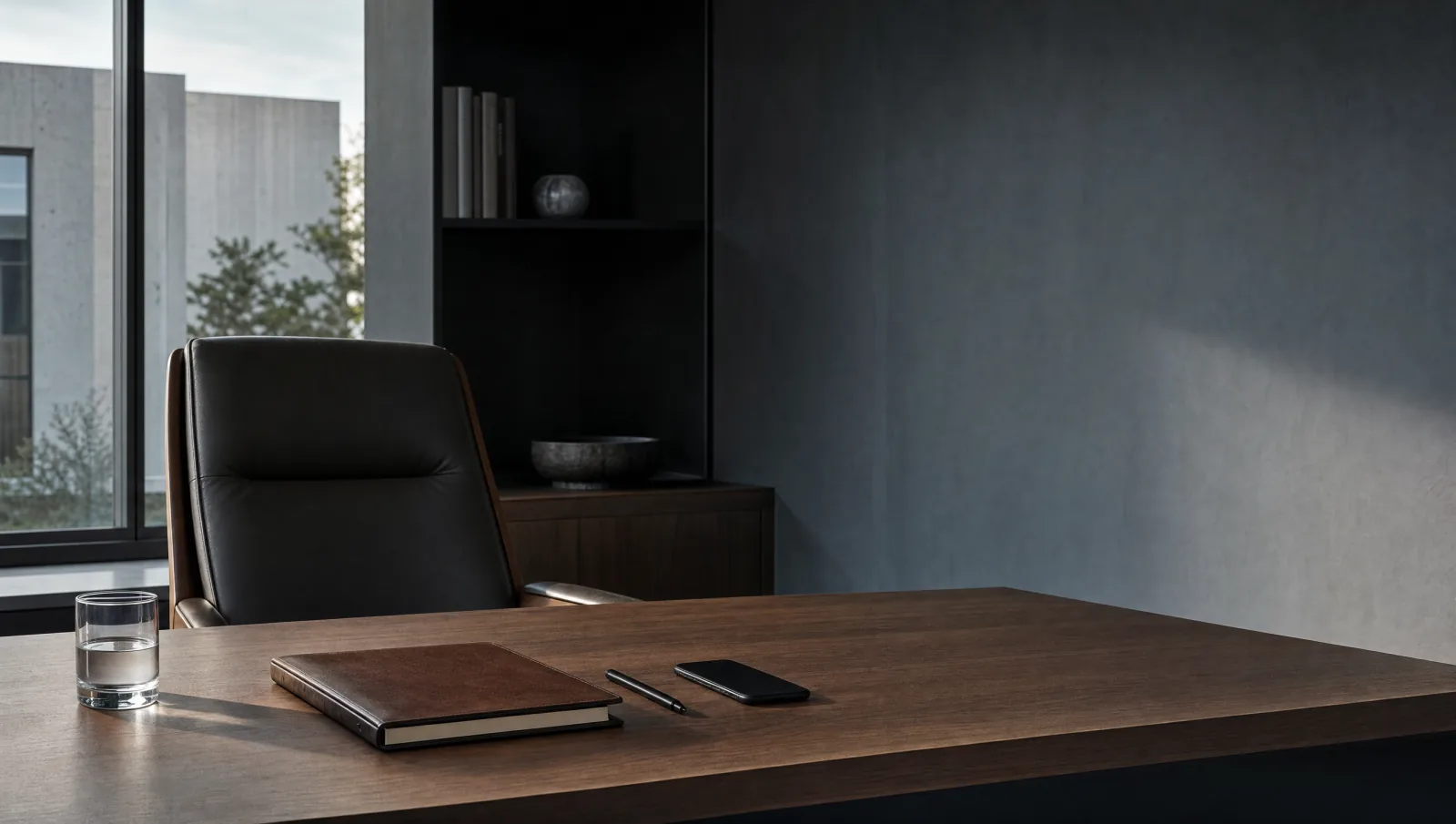 Operator's desk with notebook and phone — protocol consultation by the founder